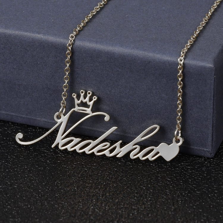 silver color personalized crown name necklace with a heart symbol